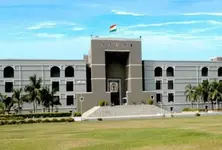 Gujarat HC demands justification from Gujarat government over 18% GST levied on sale of leasehold land in GIDC