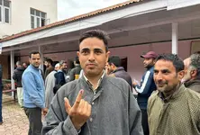 Enthusiastic voters line up outside polling stations in J&K’s Srinagar LS seat