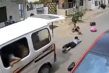 Children in danger: Two girls get tossed out of school van in Vadodara