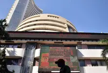 Sensex trades flat after opening in green
