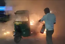 CNG auto catches fire near Anupam crossroads, prompt police action averts mishap