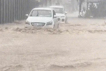 Heavy rain in Ahmedabad late at night causes waterlogging, brings cool weather