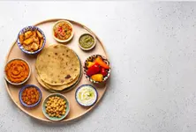 Cost of home cooked thali dips 14 per cent in July