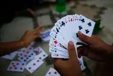 Ahmedabad Police crack down on two gambling dens, cash, valuables totalling ₹33 lakh seized