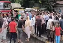 Fed up with frequent sewage overflow, Naroda residents block road