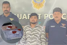 Ahmedabad youth held with rs 37300 in fake rs 100 notes ordered via courier from Noida