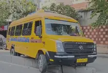Anand Niketan school bus mounts divider in Satellite area, no injuries reported