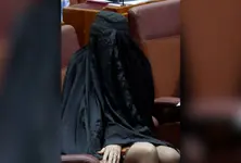 Australian senator sparks row after wearing burqa to parliament, demanding nationwide-ban