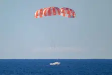 Astronauts return after venturing where no human had gone before, raising hope for humanity