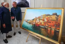 Italian artist Giampaolo Tomassetti presents PM Modi with a painting on Varanasi