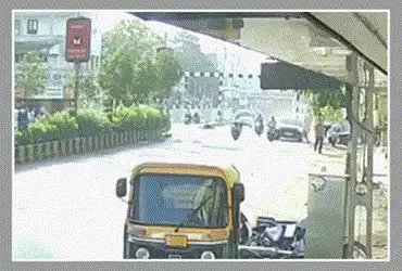 Minor driving overspeeding car hits elderly moped rider in Rajkot, CCTV captures crash
